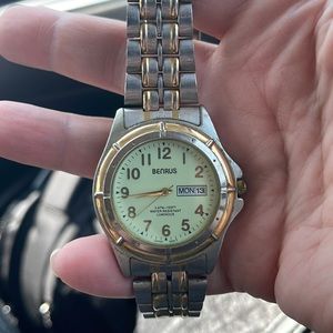 Watch for men or women, Benrus watch, stainless steel water resistant.